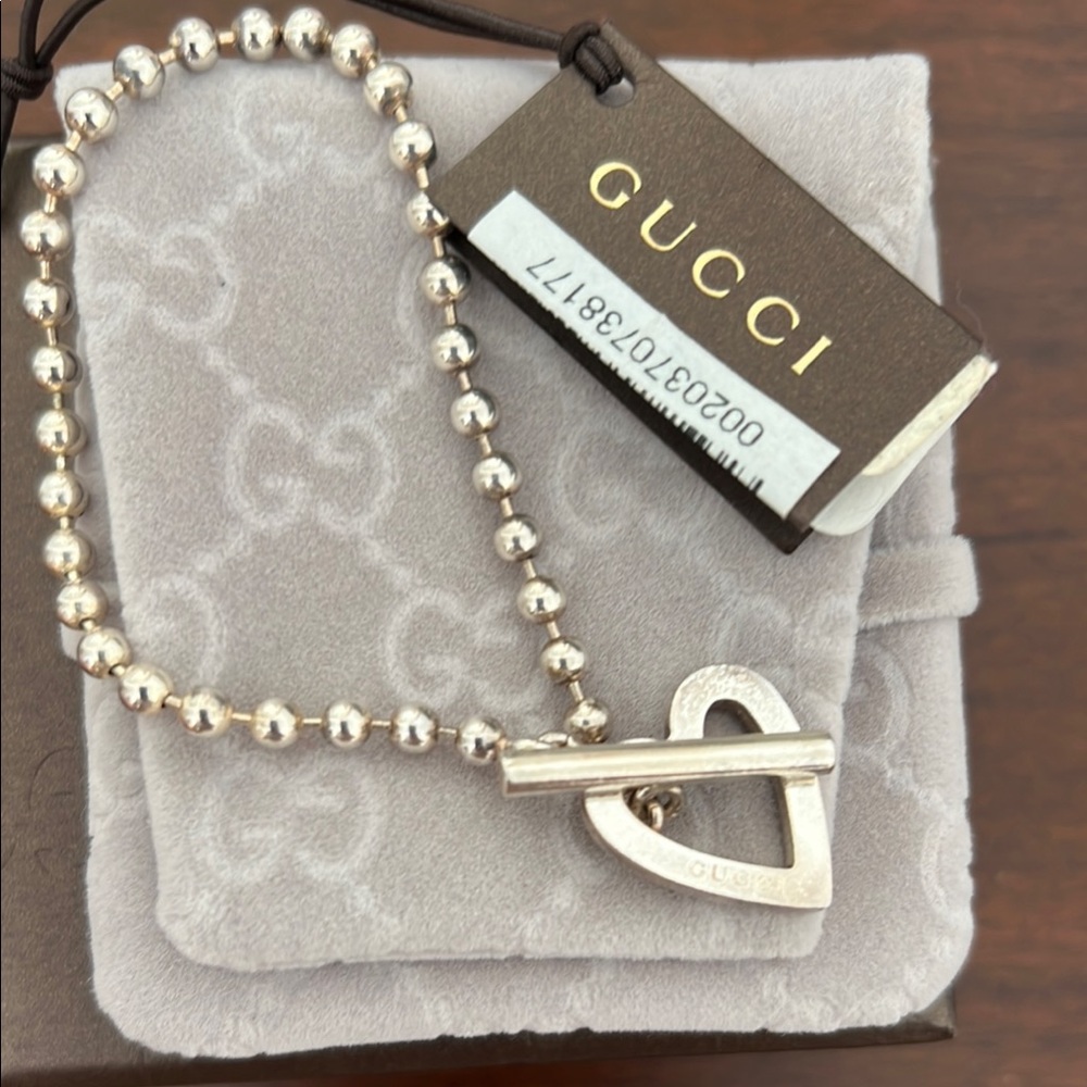 Gucci Sterling Silver Heart Charm bracelet